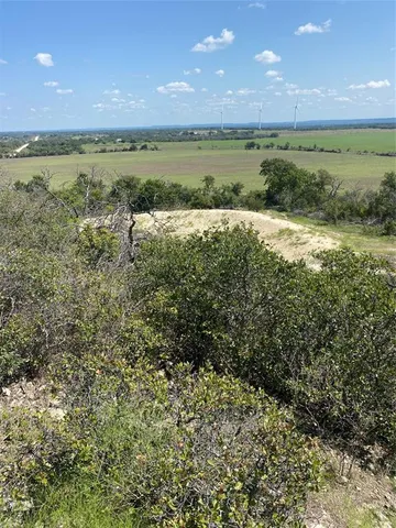 a view of a lake from a yard