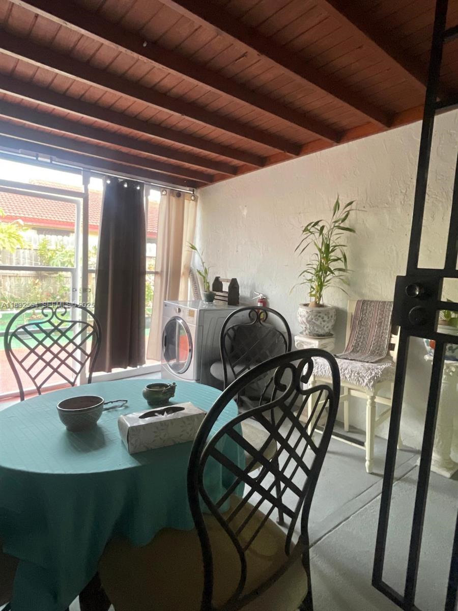 12057 Southwest 10th Street, Unit 202 Miami, FL 33184 - Photo 12 of 12 a room with furniture
