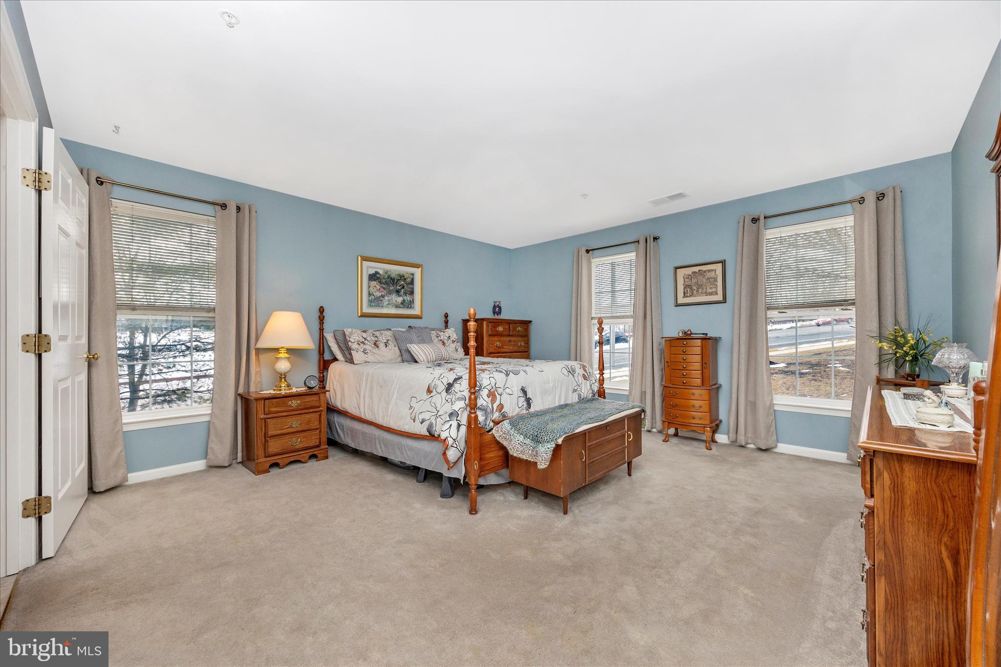 25900 Ridge Manor Drive, Unit 6000B Damascus, MD 20872 - Photo 24 of 39 a bed room with a bed and a chair