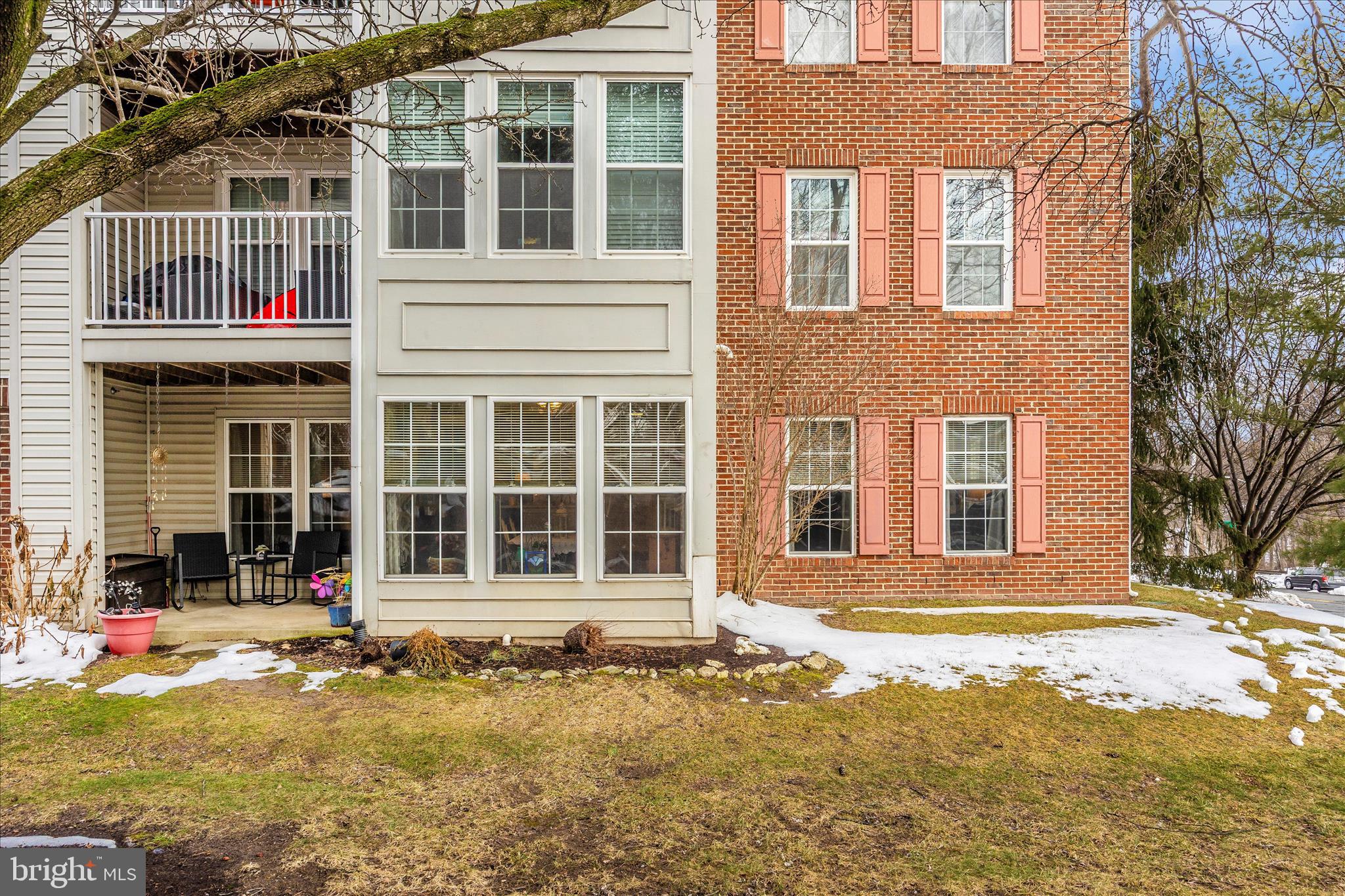 25900 Ridge Manor Drive, Unit 6000B Damascus, MD 20872 - Photo 35 of 39 a front view of a house with a yard