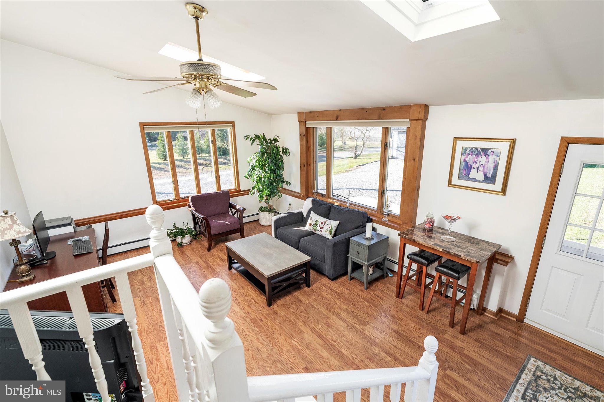 151 Walnford Road Allentown, NJ 08501 - Photo 11 of 49 a living room with furniture and a flat screen tv