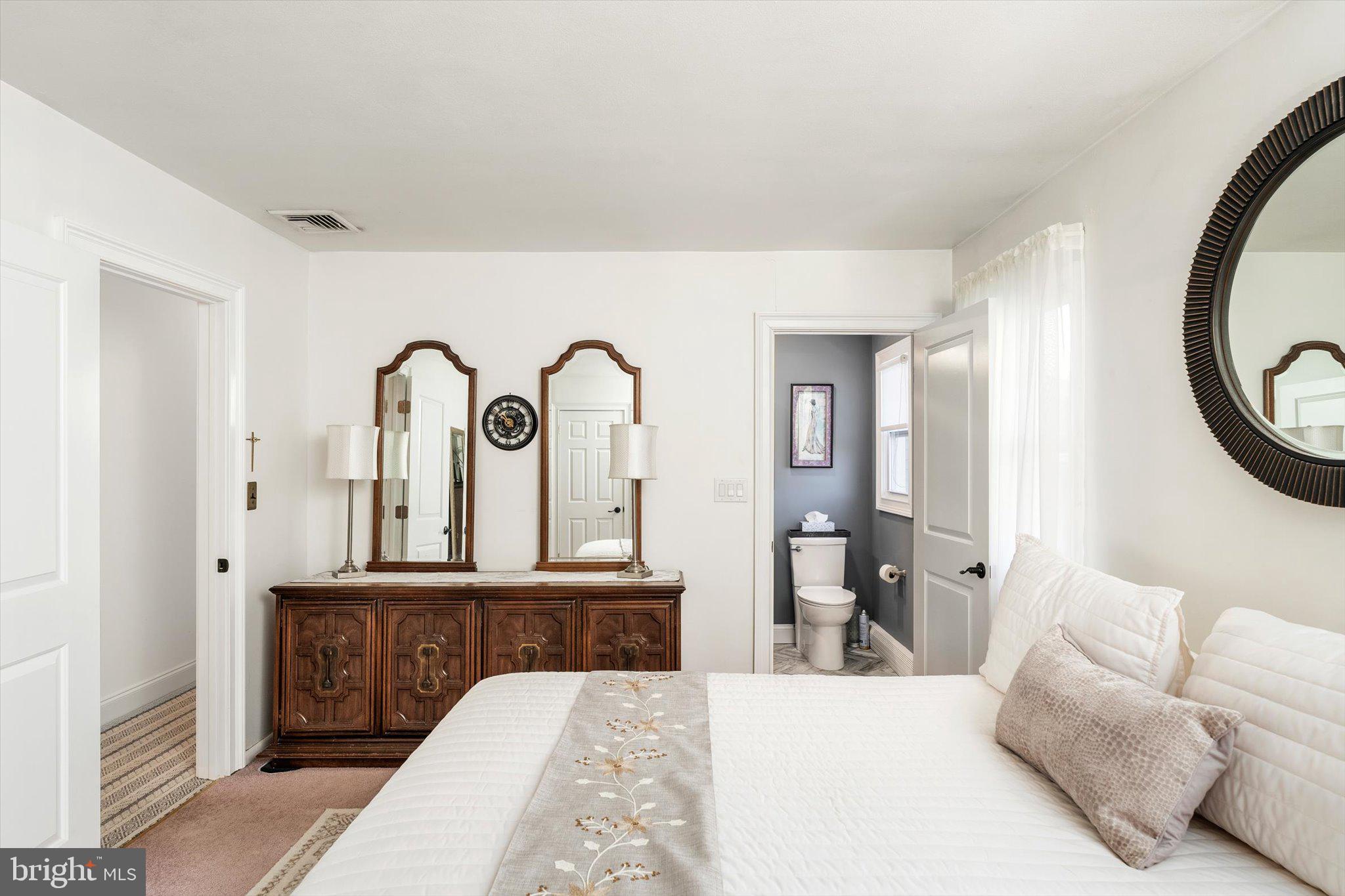 151 Walnford Road Allentown, NJ 08501 - Photo 15 of 49 a living room with furniture and a mirror