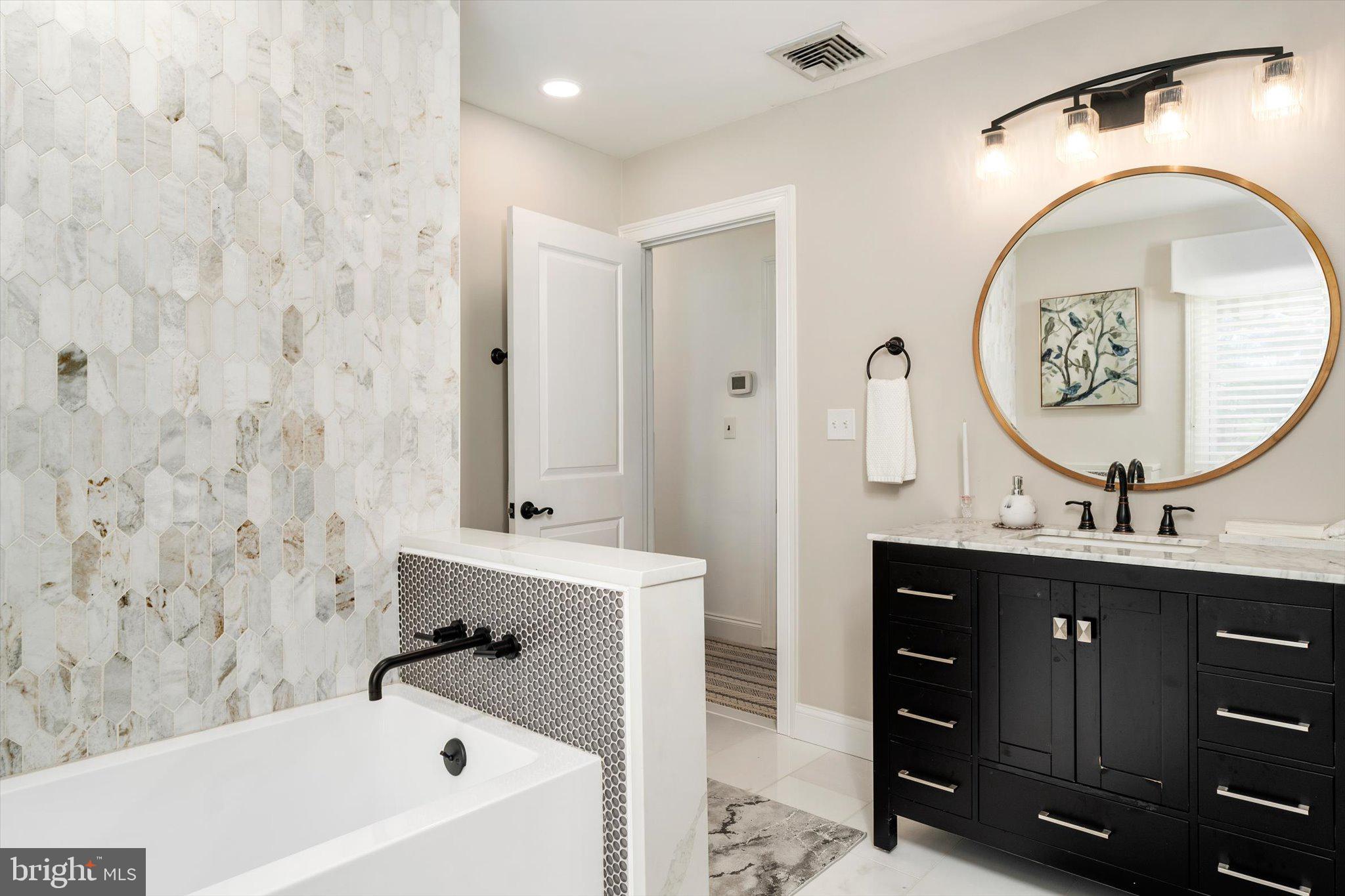 151 Walnford Road Allentown, NJ 08501 - Photo 18 of 49 a bathroom with a sink and a mirror