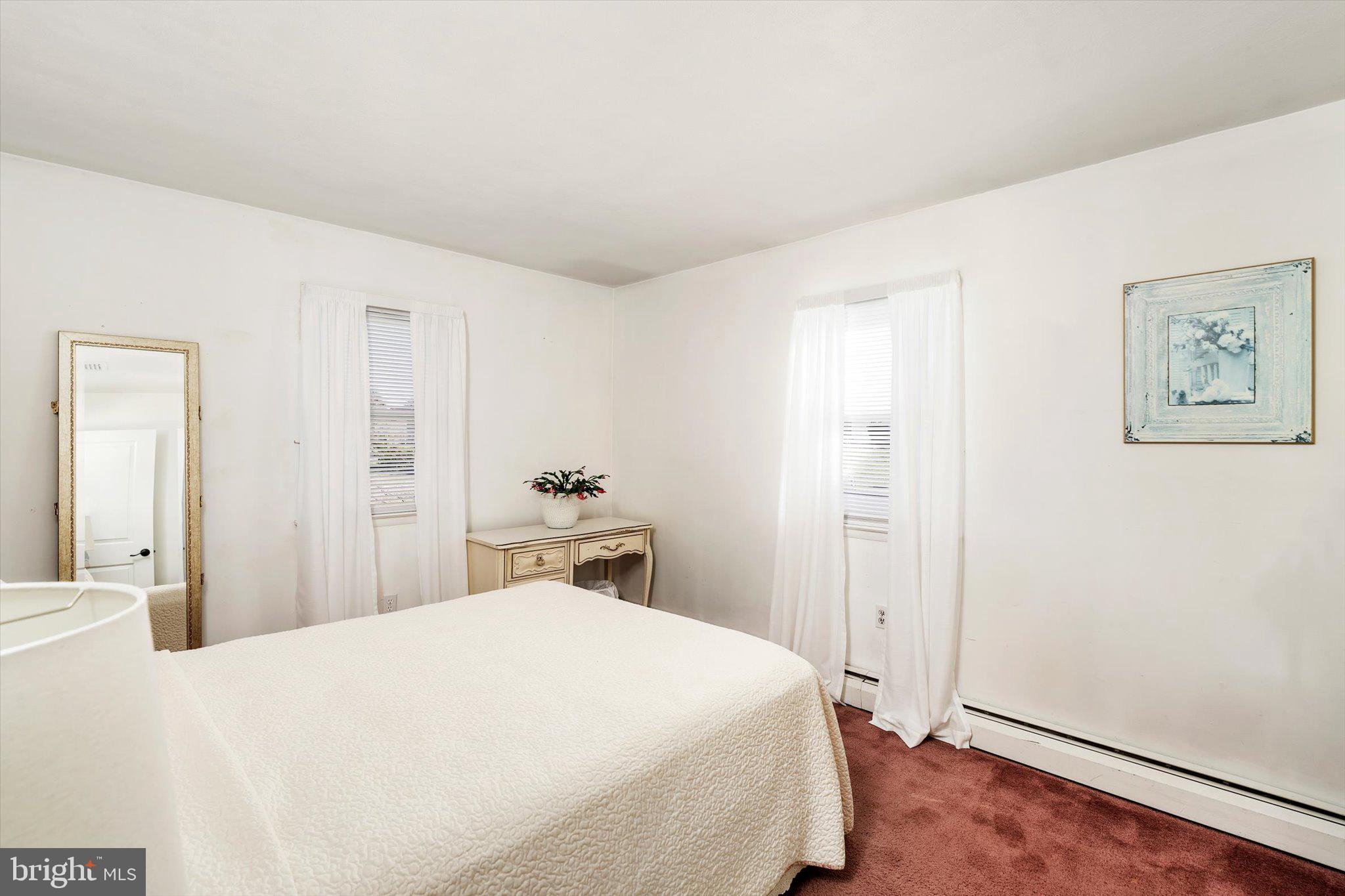 151 Walnford Road Allentown, NJ 08501 - Photo 21 of 49 a bedroom with a bed and a window