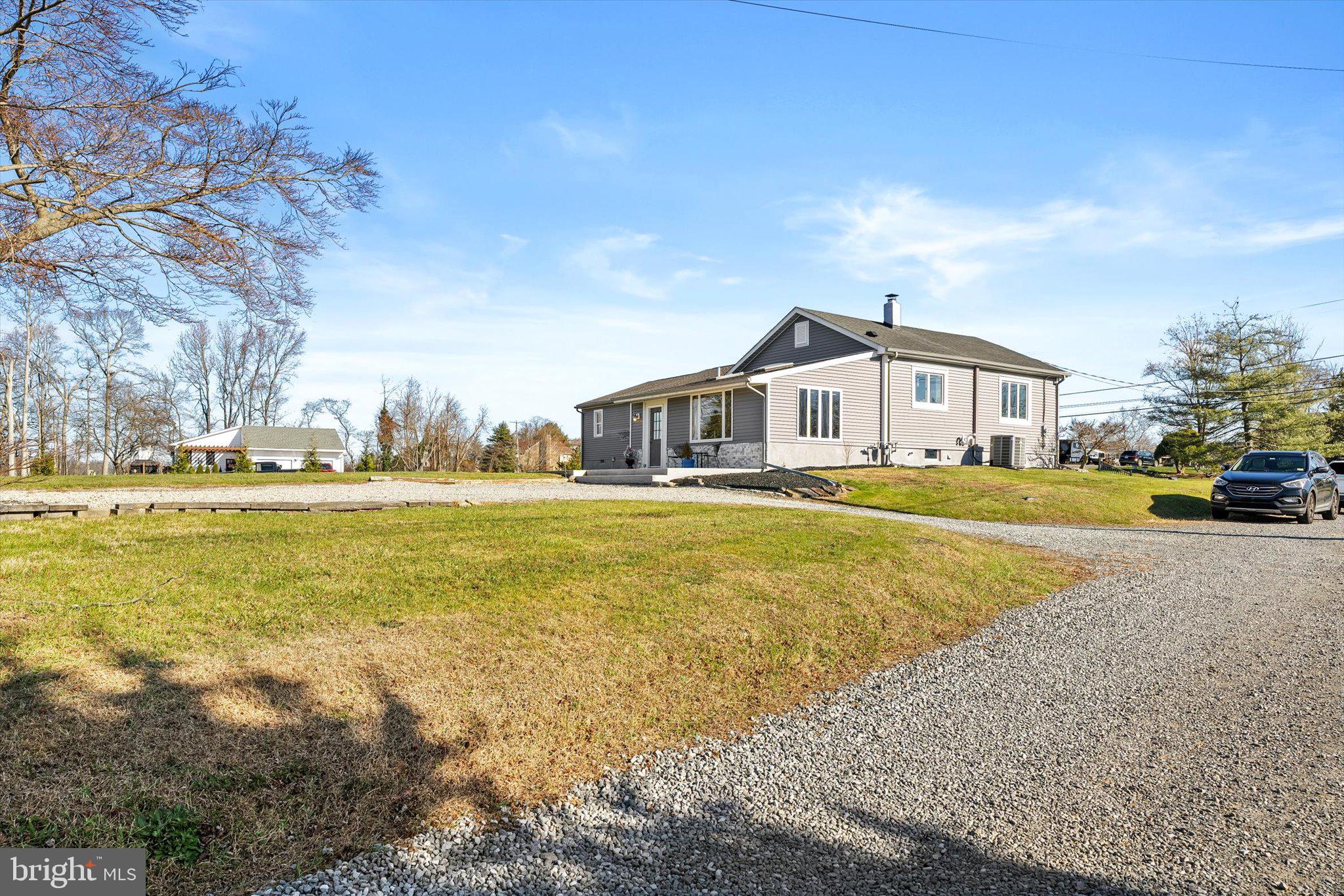 151 Walnford Road Allentown, NJ 08501 - Photo 29 of 49 a view of an ocean with a building in the background