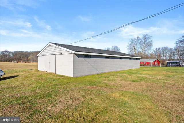 a view of a hallway with staircase