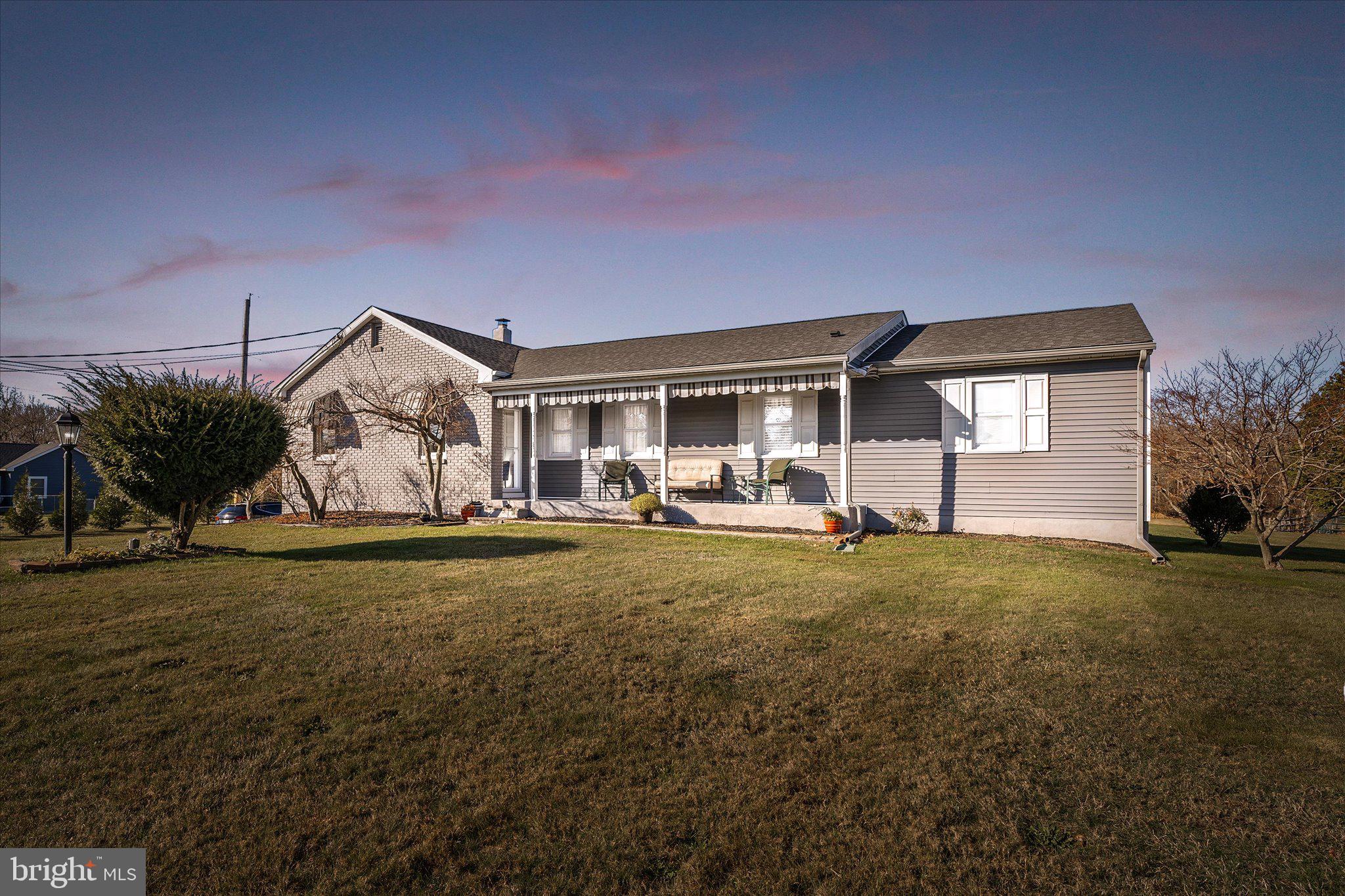 151 Walnford Road Allentown, NJ 08501 - Photo 46 of 49 a front view of a house with garden