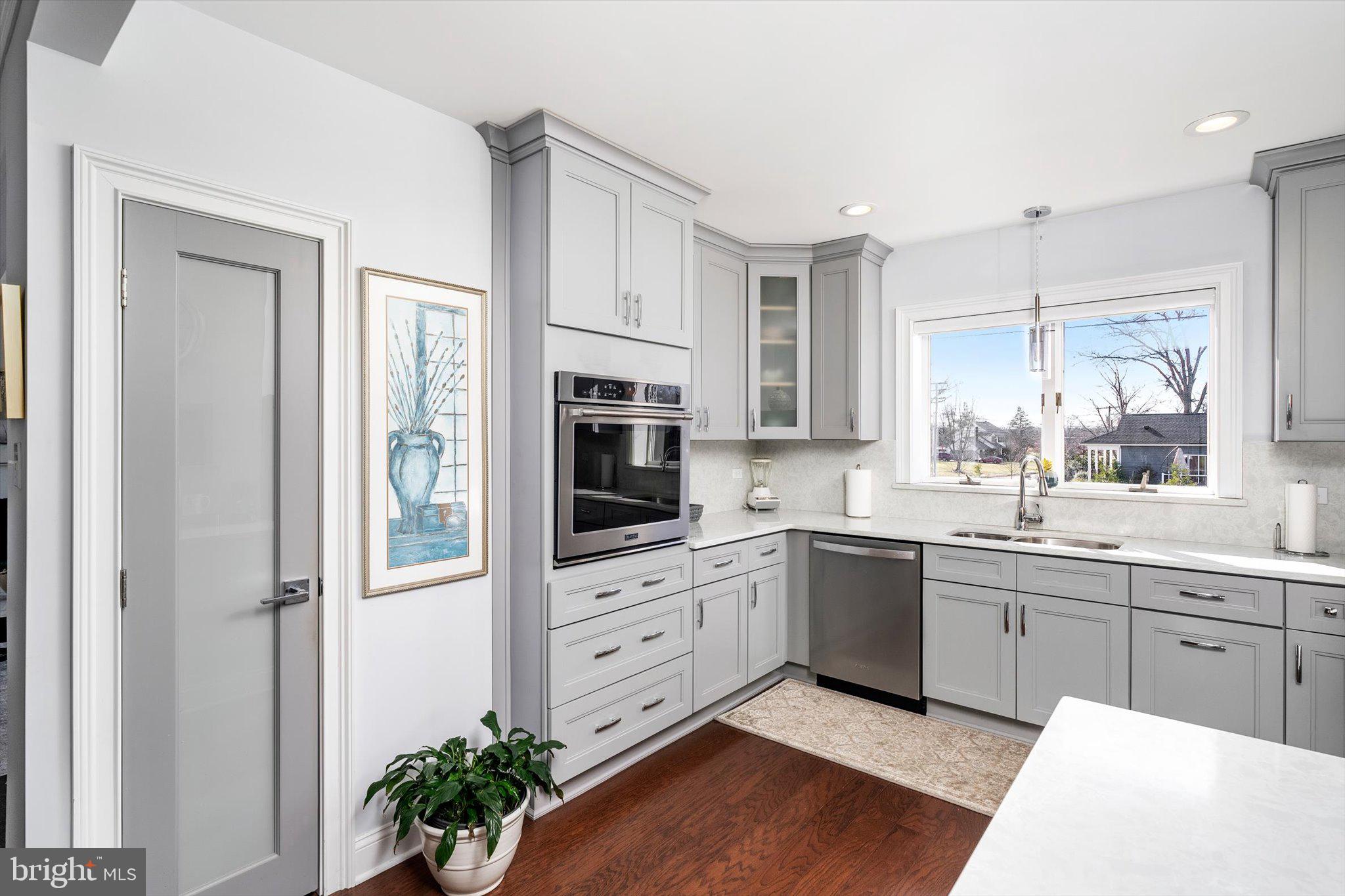 151 Walnford Road Allentown, NJ 08501 - Photo 7 of 49 a kitchen with white cabinets and white appliances
