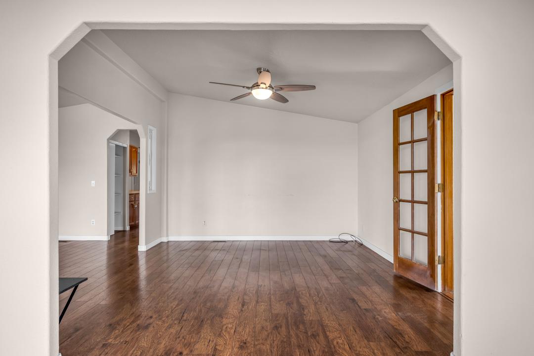 10721 Shenandoah Road Plymouth, CA 95669 - Photo 11 of 48 wooden floor in an empty room with a window