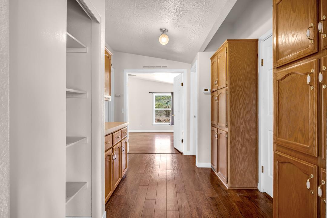 10721 Shenandoah Road Plymouth, CA 95669 - Photo 21 of 48 a view of hallway with wooden floor