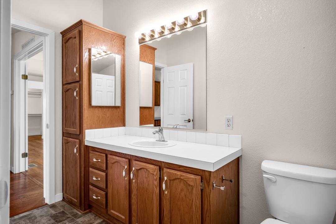 10721 Shenandoah Road Plymouth, CA 95669 - Photo 24 of 48 a bathroom with a sink and a mirror