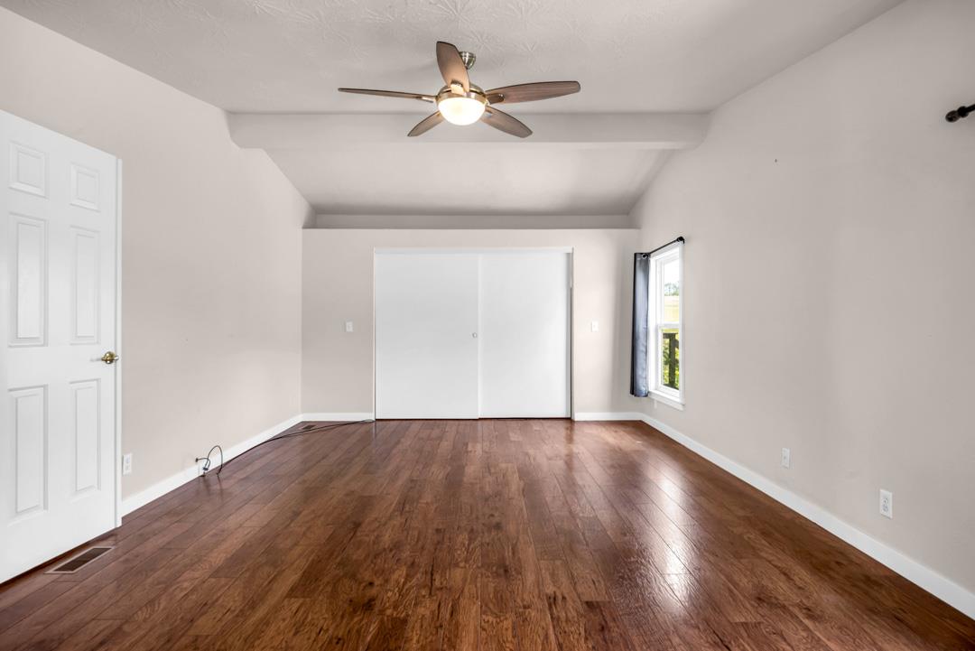 10721 Shenandoah Road Plymouth, CA 95669 - Photo 34 of 48 wooden floor in an empty room with a window