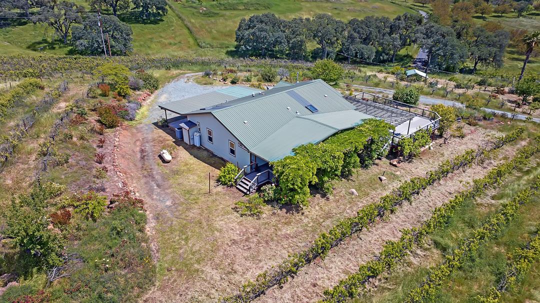 10721 Shenandoah Road Plymouth, CA 95669 - Photo 38 of 48 an aerial view of a house with a yard