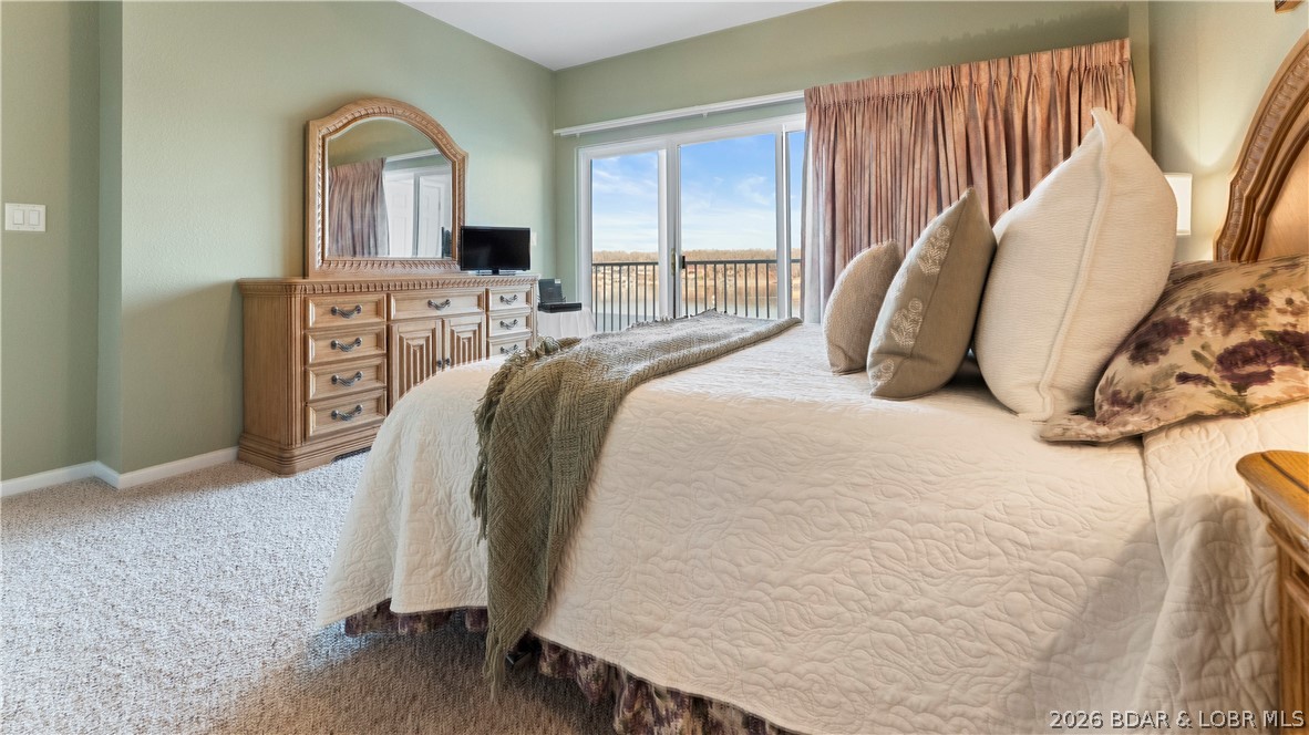 1181 Jeffries Road, Unit B307 Osage Beach, MO 65065 - Photo 20 of 45 Primary Bedroom