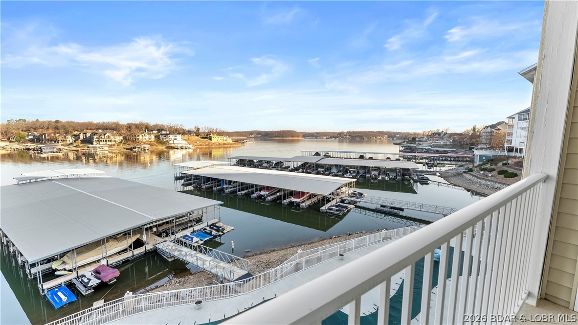 1181 Jeffries Road, Unit B307 Osage Beach, MO 65065 - Photo 28 of 45 a balcony that overlooks the complex pool and your