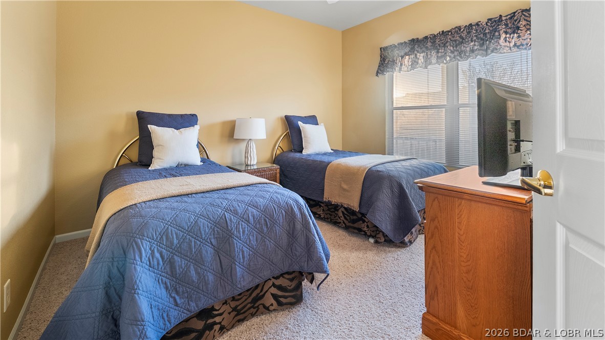 1181 Jeffries Road, Unit B307 Osage Beach, MO 65065 - Photo 5 of 45 Guest Bedroom