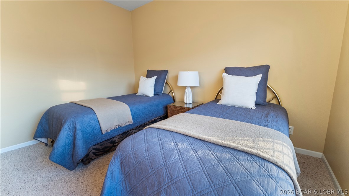 1181 Jeffries Road, Unit B307 Osage Beach, MO 65065 - Photo 6 of 45 Guest Bedroom
