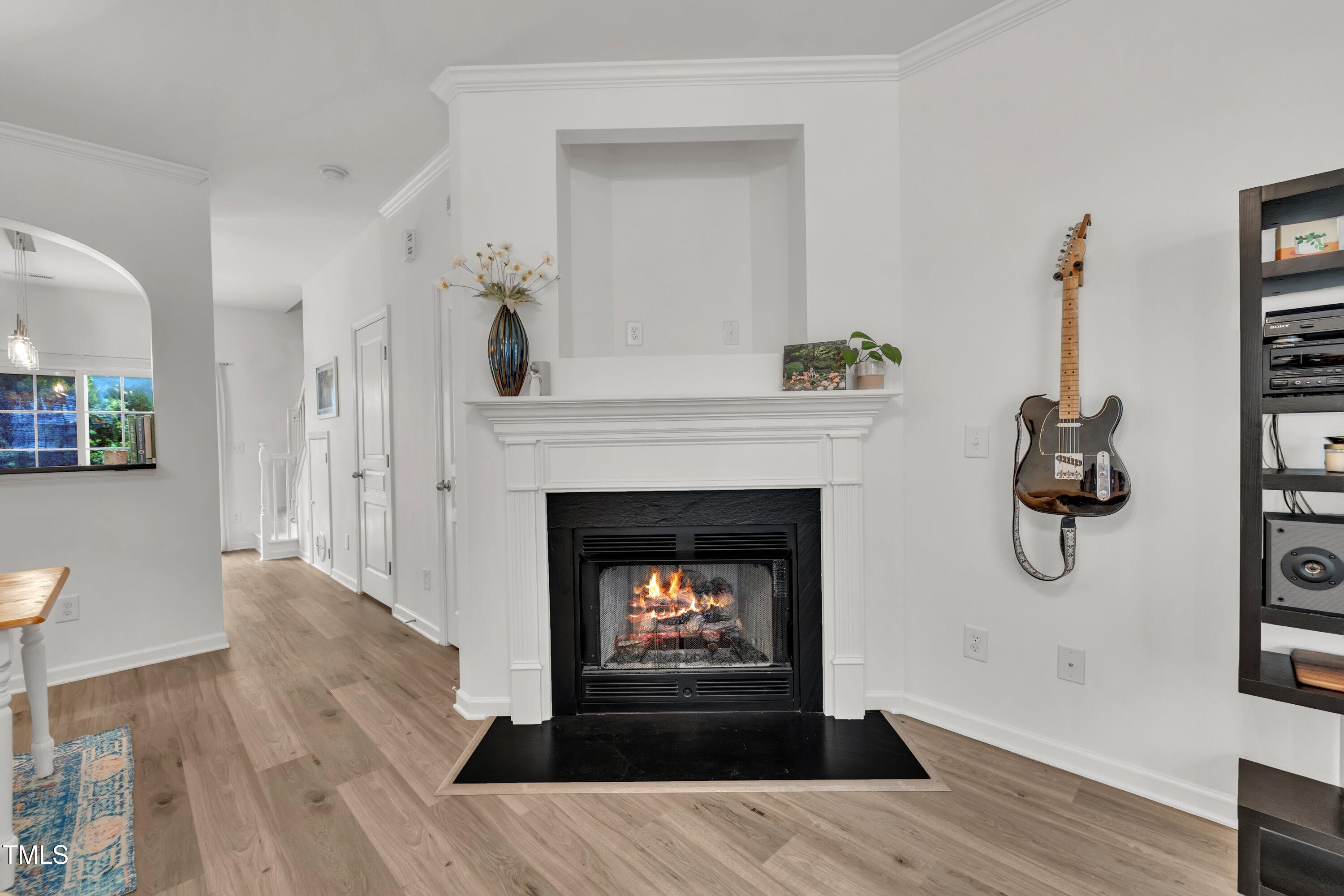 3583 Sugar Tree Place Durham, NC 27713 - Photo 11 of 50 a living room with furniture and a fireplace