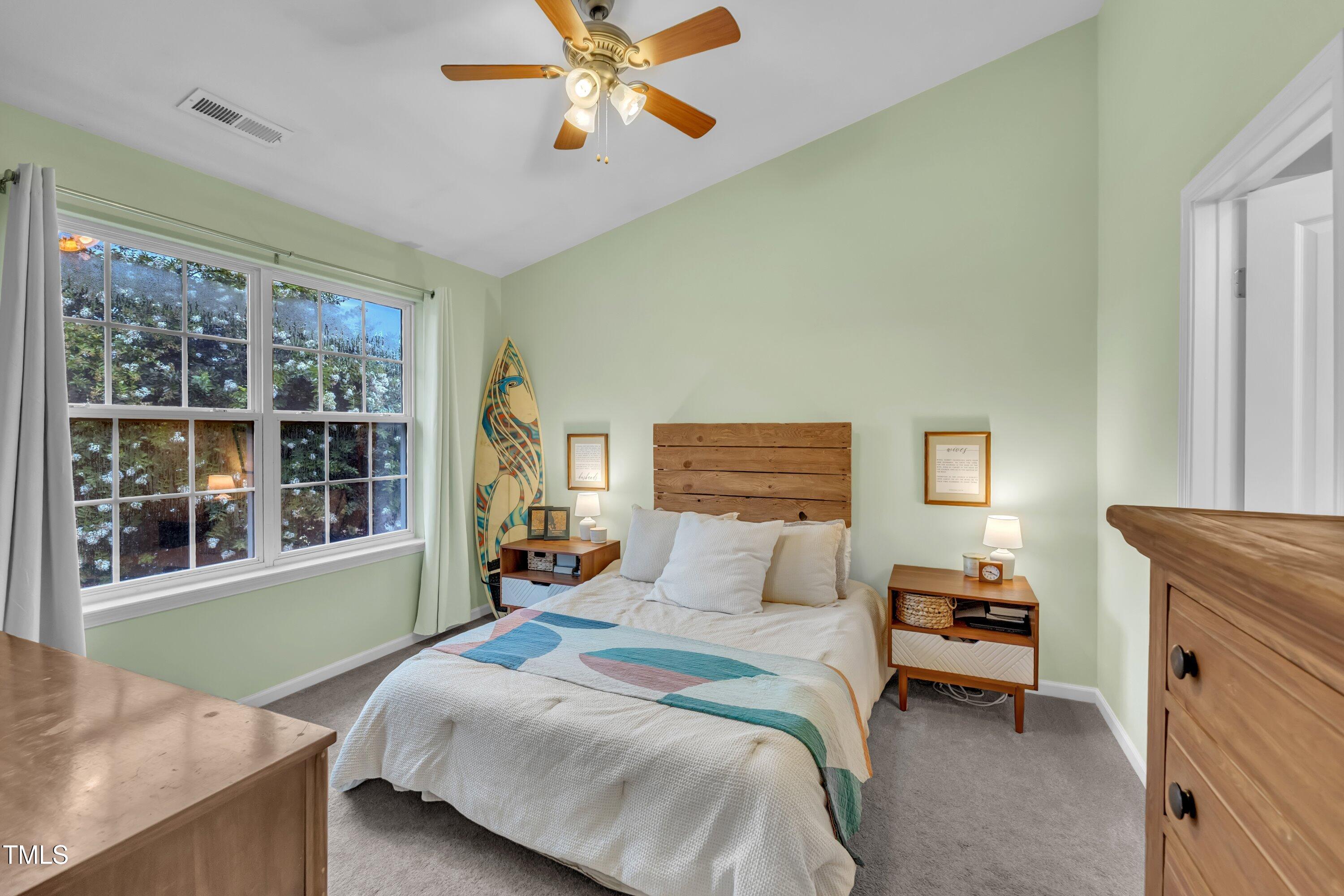 3583 Sugar Tree Place Durham, NC 27713 - Photo 22 of 50 a bedroom with a bed and a window