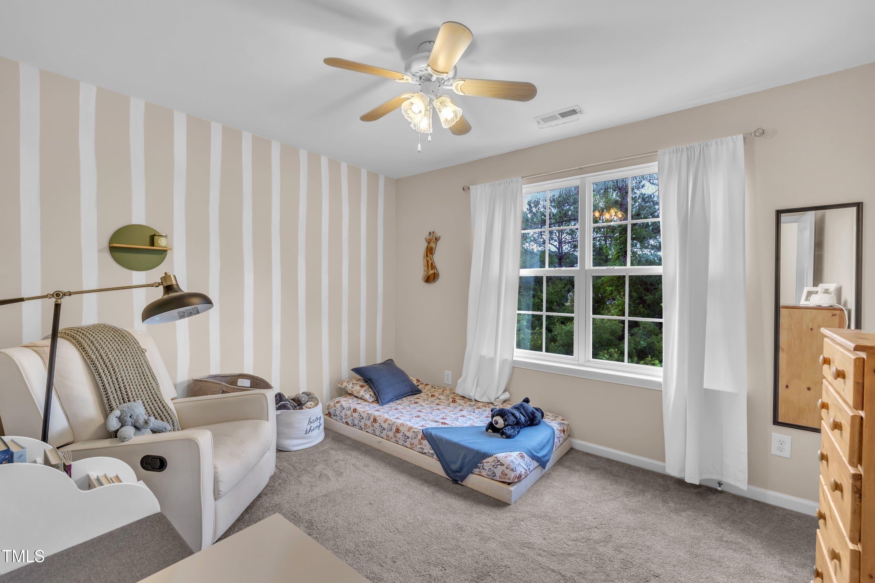 3583 Sugar Tree Place Durham, NC 27713 - Photo 29 of 50 a living room with furniture and a window