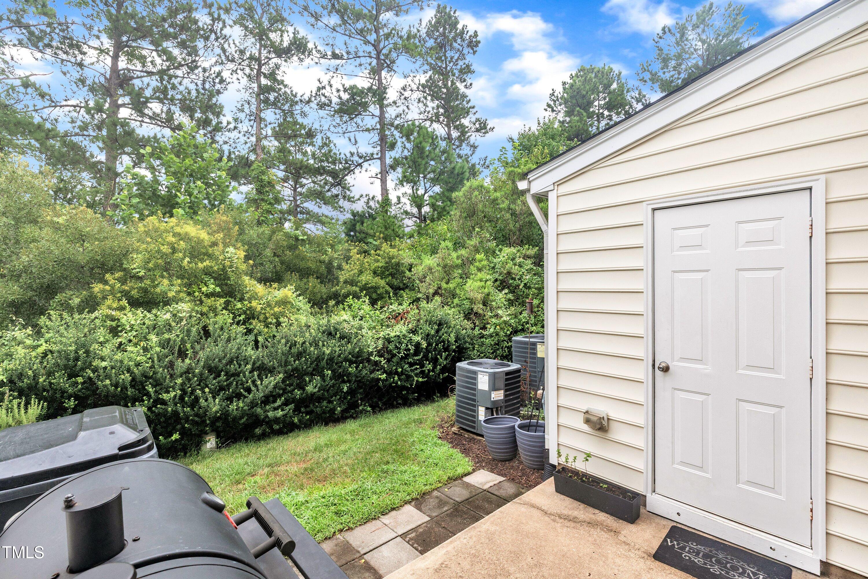 3583 Sugar Tree Place Durham, NC 27713 - Photo 31 of 50 a view of a backyard with plants
