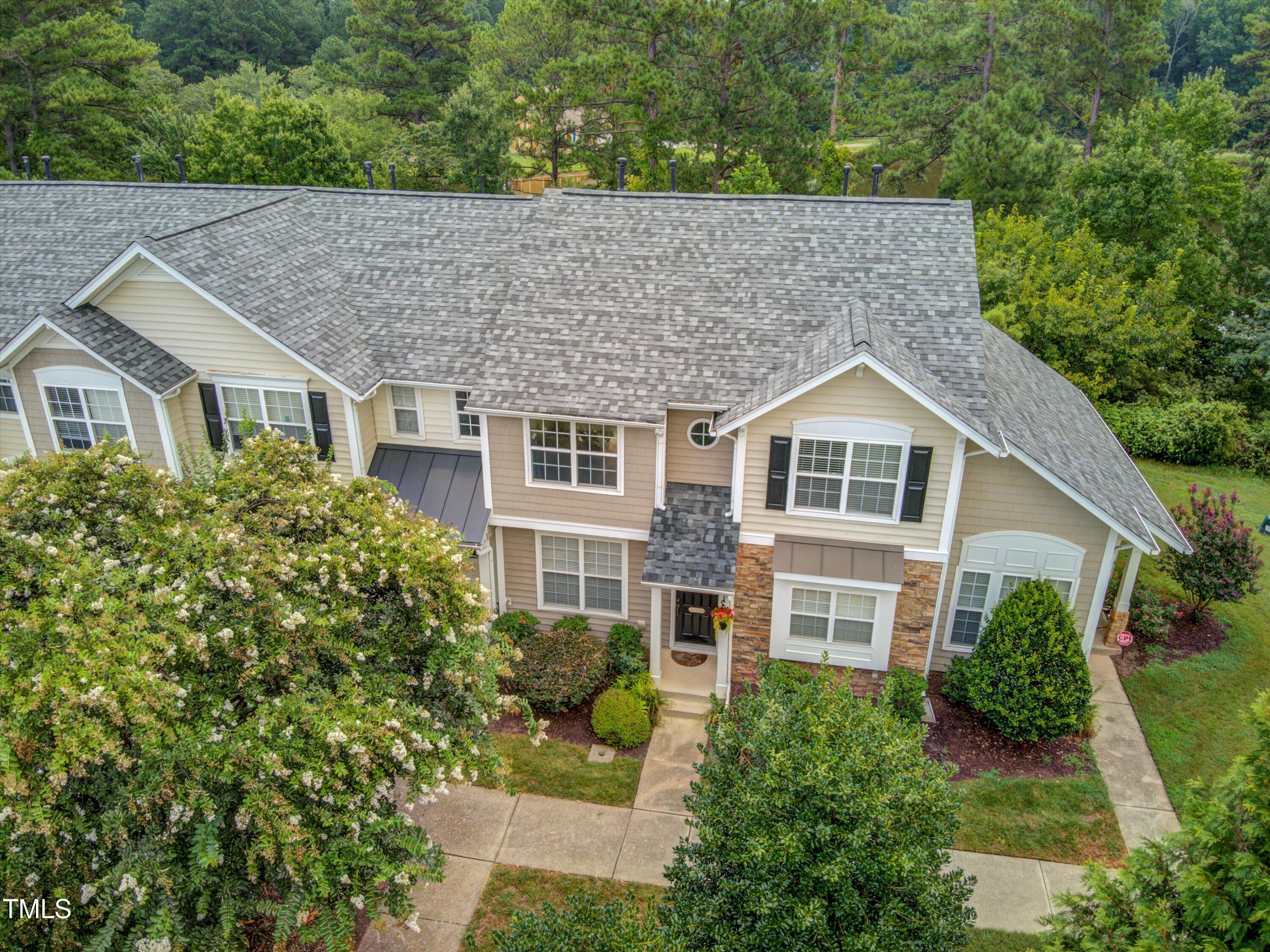 3583 Sugar Tree Place Durham, NC 27713 - Photo 34 of 50 a aerial view of a house with a yard and potted plants