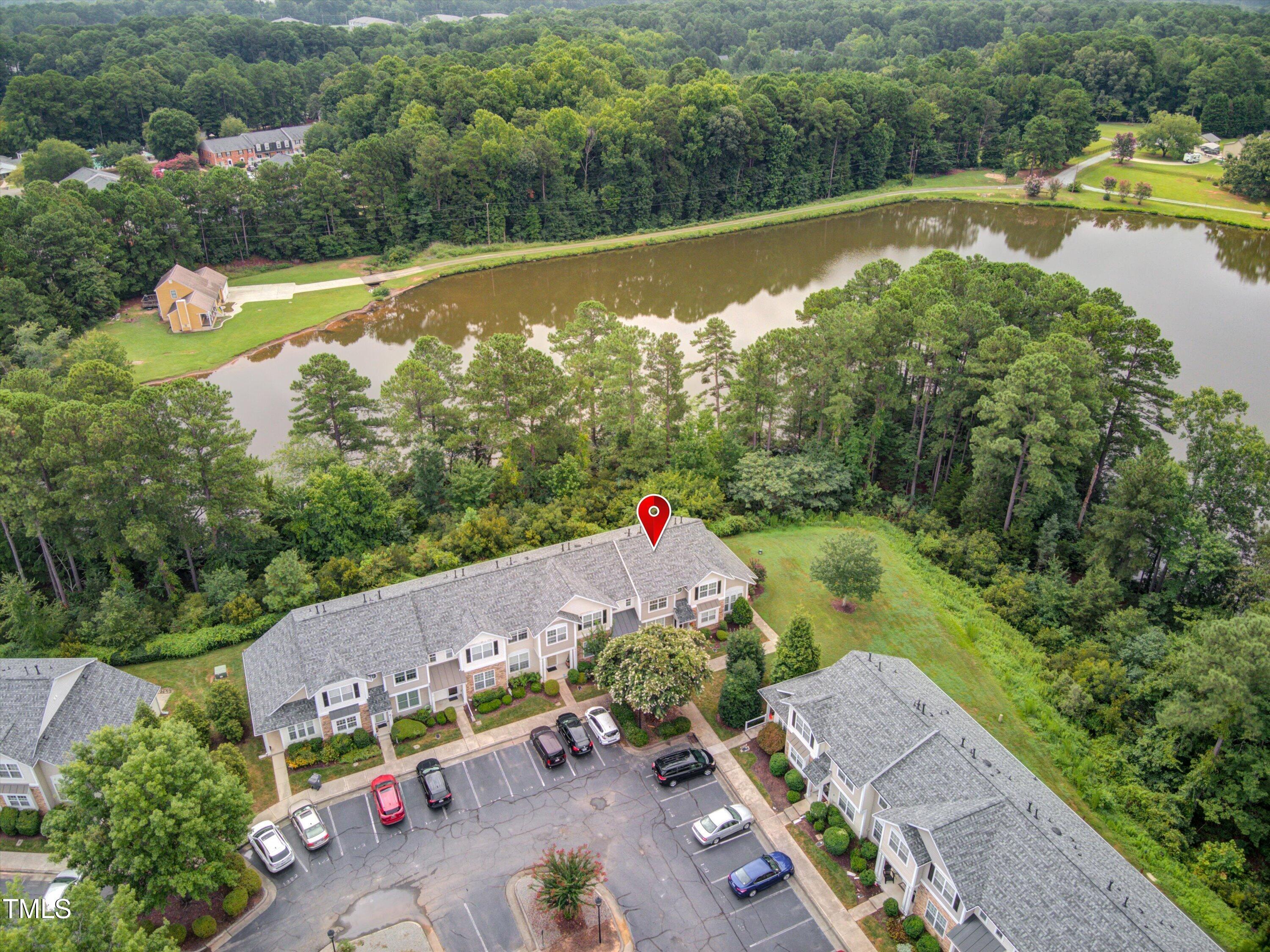3583 Sugar Tree Place Durham, NC 27713 - Photo 36 of 50 an aerial view of a house with a swimming pool outdoor seating and yard