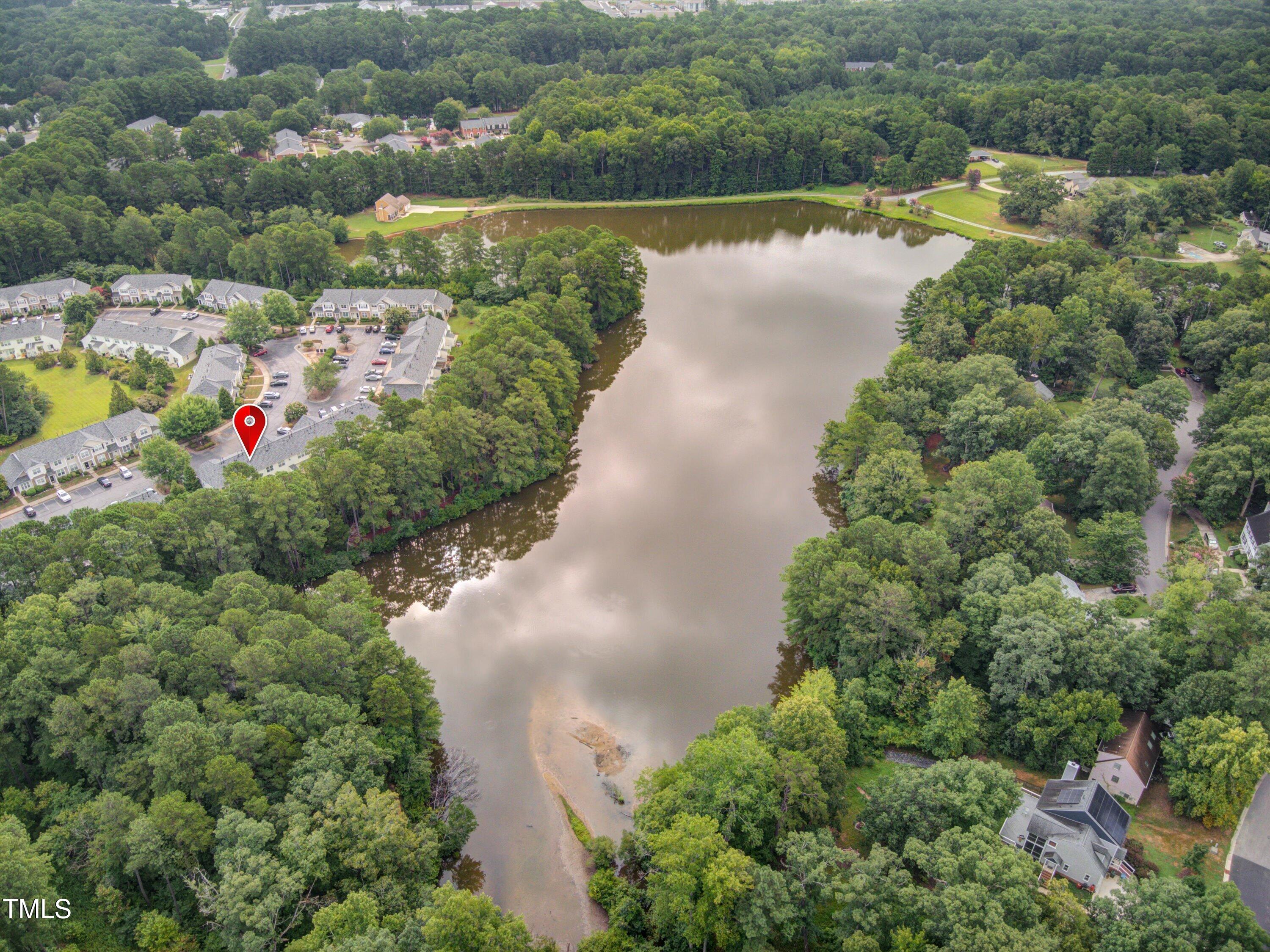 3583 Sugar Tree Place Durham, NC 27713 - Photo 41 of 50 an aerial view of a house with a yard and lake view