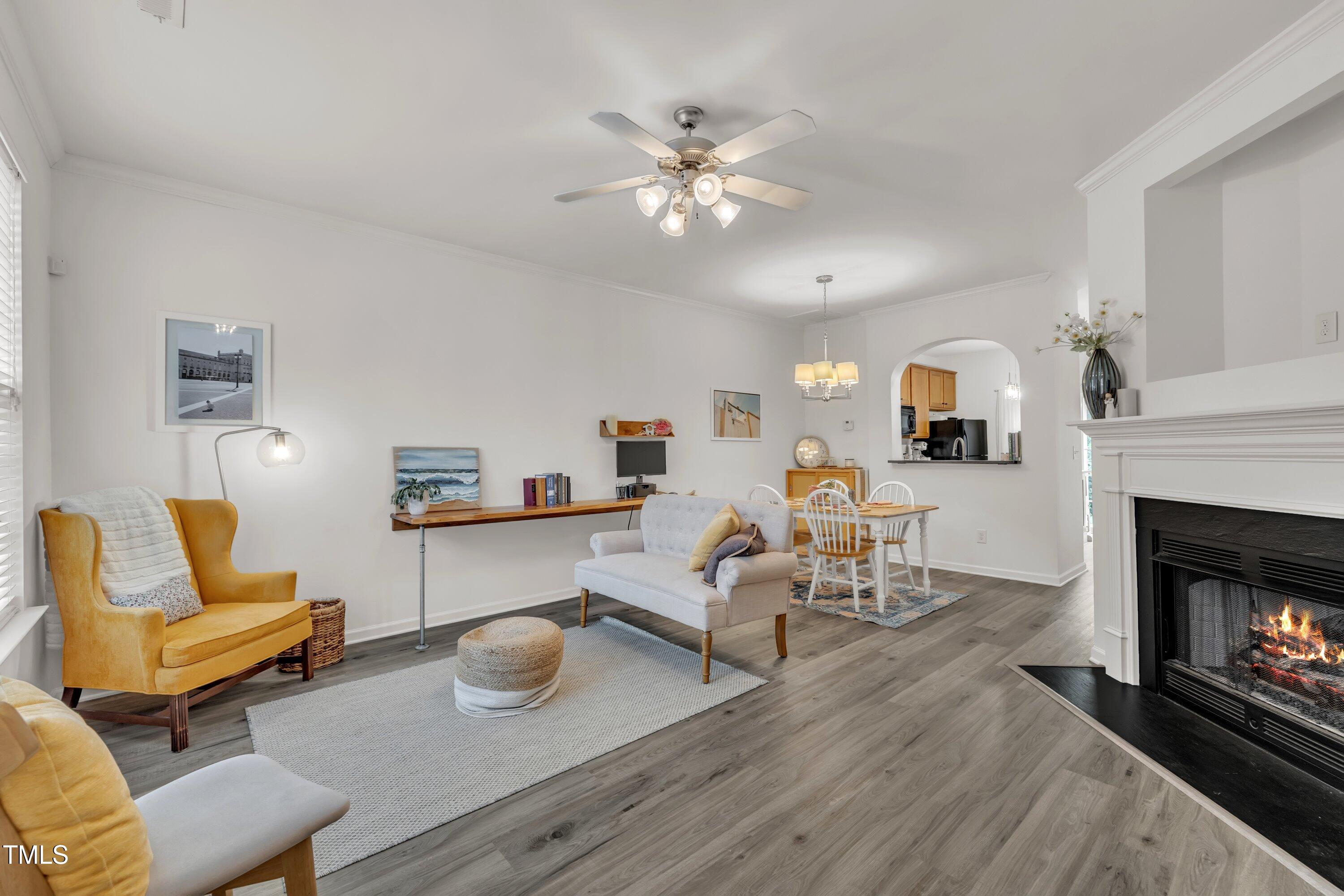 3583 Sugar Tree Place Durham, NC 27713 - Photo 5 of 50 a living room with furniture and a fireplace