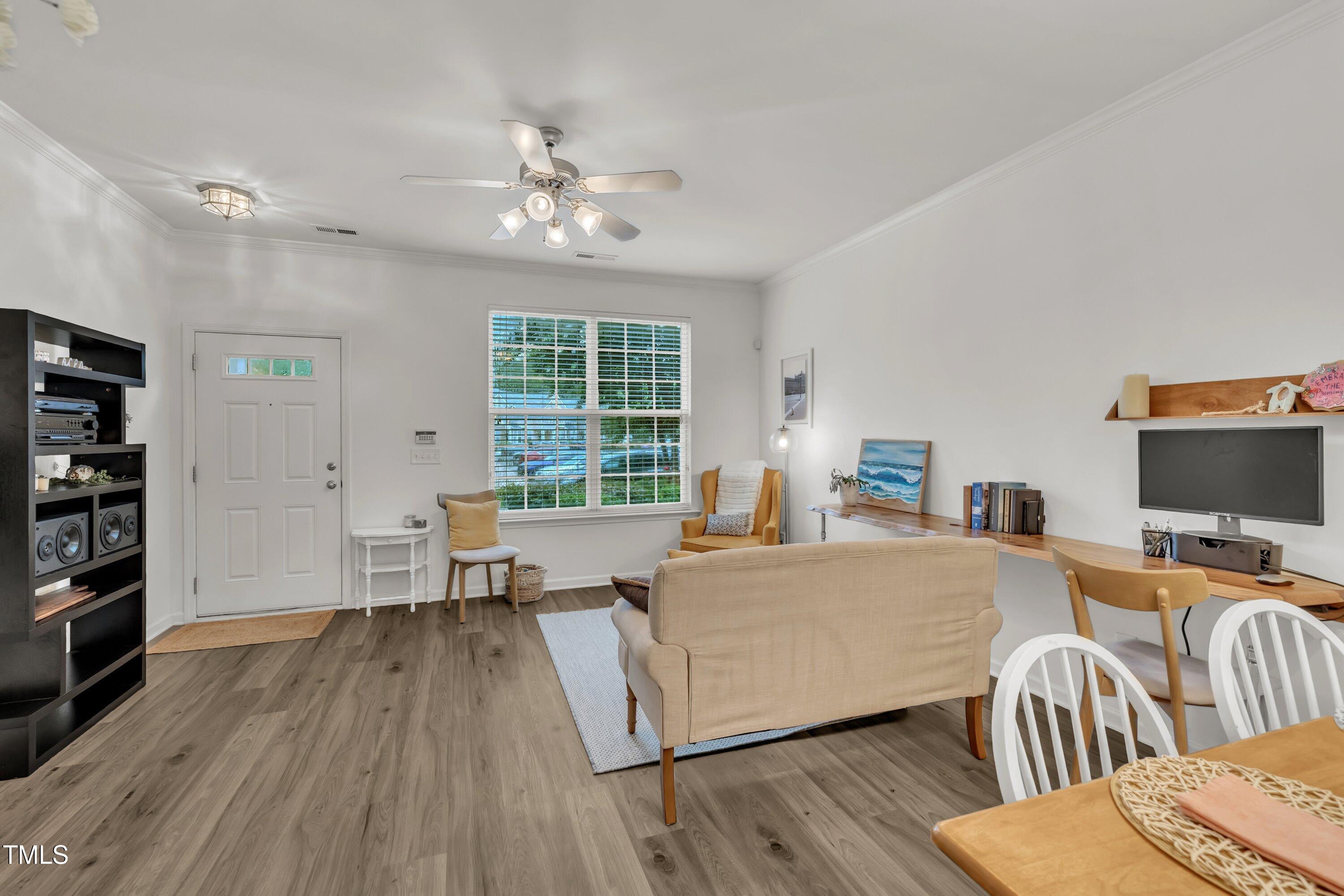 3583 Sugar Tree Place Durham, NC 27713 - Photo 7 of 50 a living room with furniture and a flat screen tv