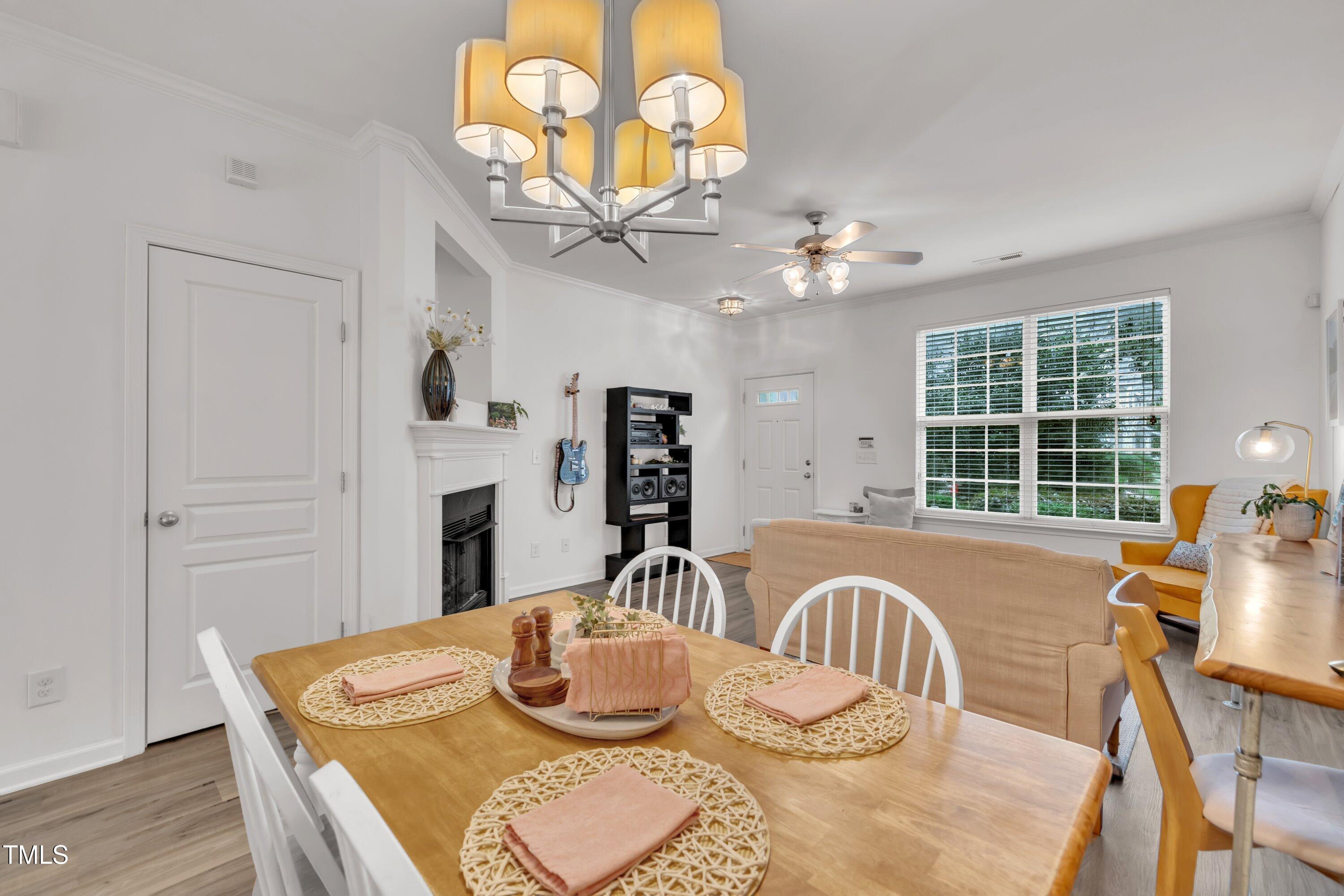 3583 Sugar Tree Place Durham, NC 27713 - Photo 9 of 50 a view of a dining room with furniture window and outside view