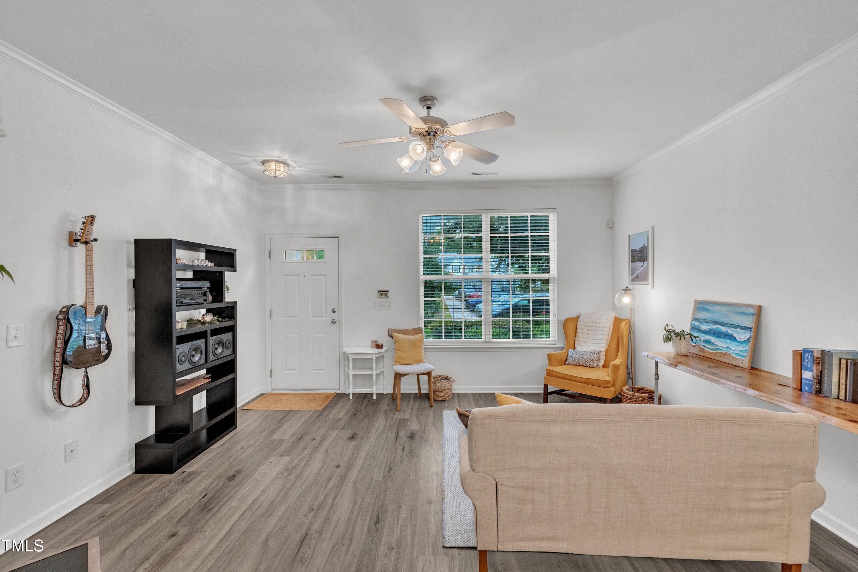 3583 Sugar Tree Place Durham, NC 27713 - Photo 10 of 50 a living room with furniture and a large window