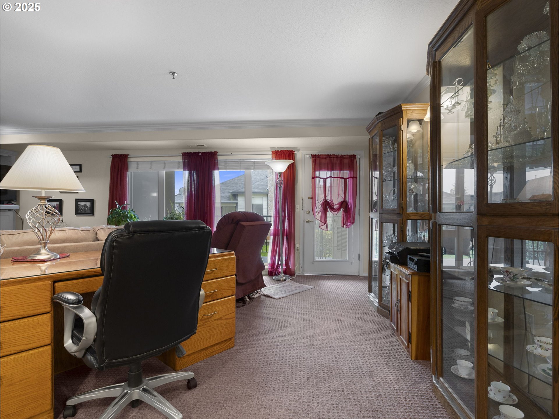 15530 Northeast Knott Street, Unit 32 Portland, OR 97230 - Photo 14 of 48 a view of a workspace with furniture and a window