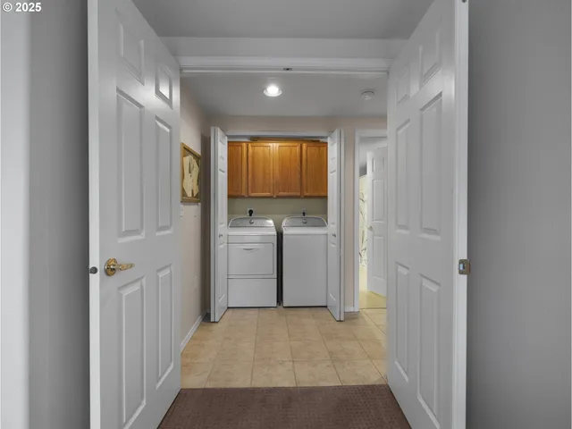 a bed room with a bed window and a chair