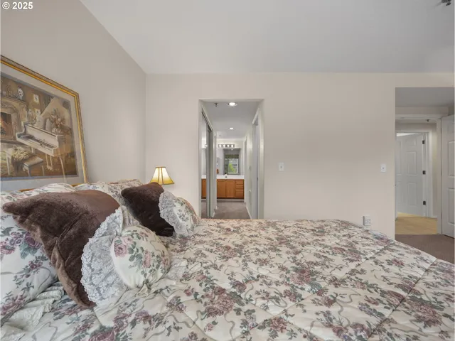 a view of a hallway with a washer and dryer