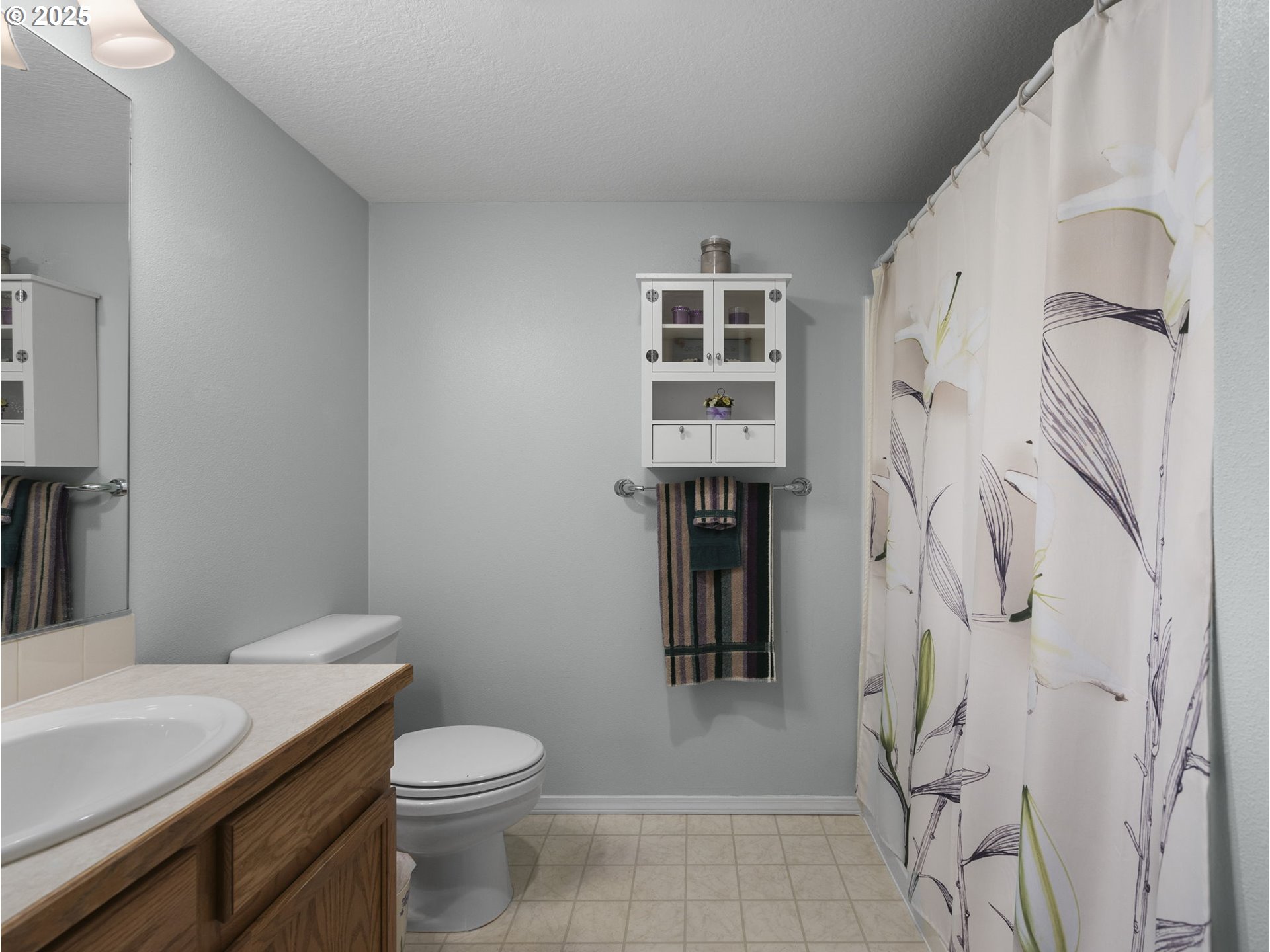 15530 Northeast Knott Street, Unit 32 Portland, OR 97230 - Photo 35 of 48 a bathroom with a sink toilet and shower