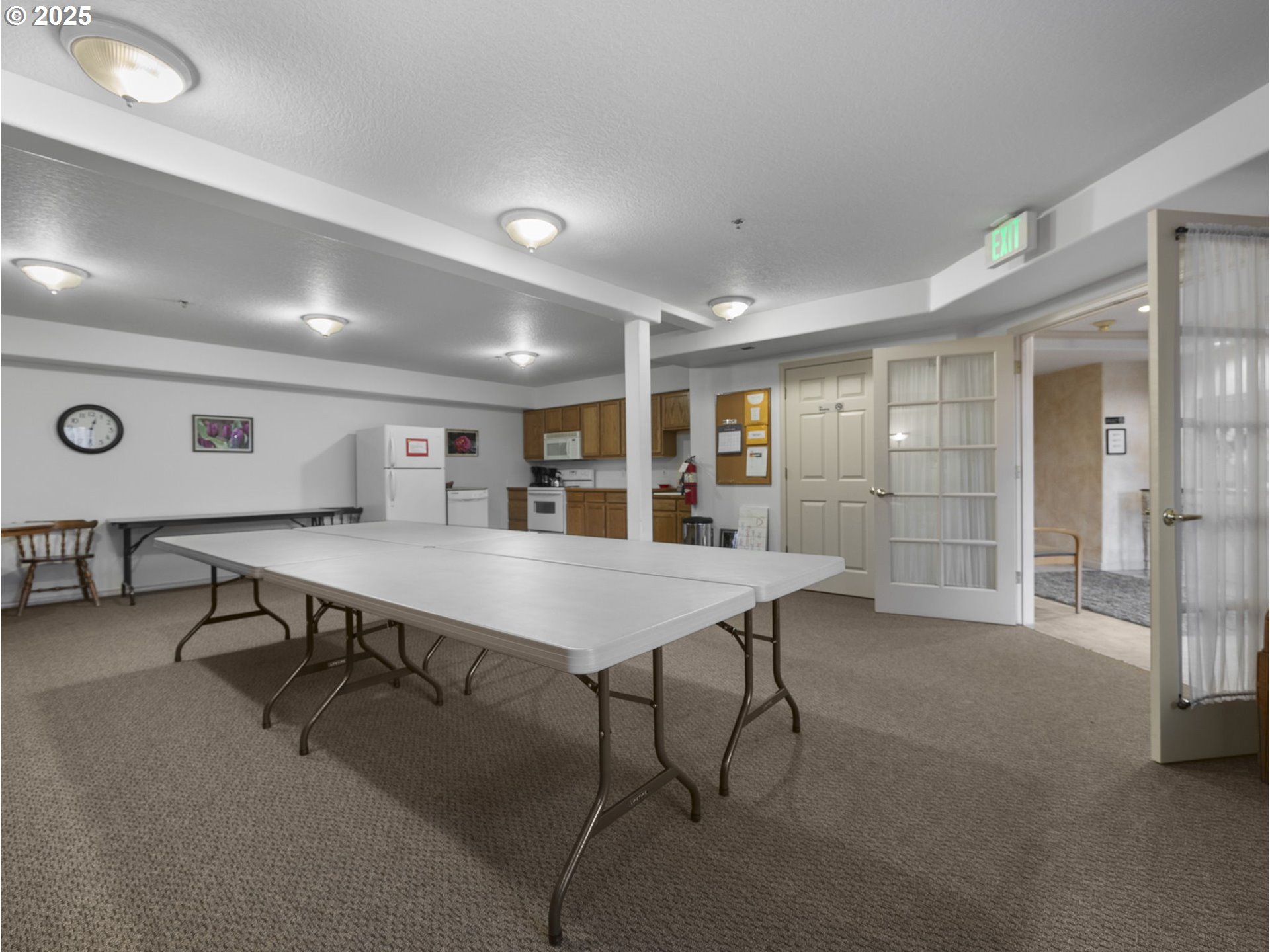 15530 Northeast Knott Street, Unit 32 Portland, OR 97230 - Photo 46 of 48 a room with furniture and a table