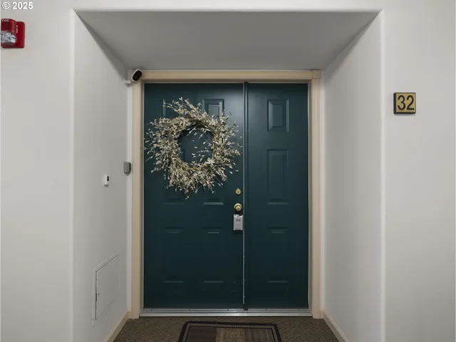 a very nice looking room with a large mirror and shower