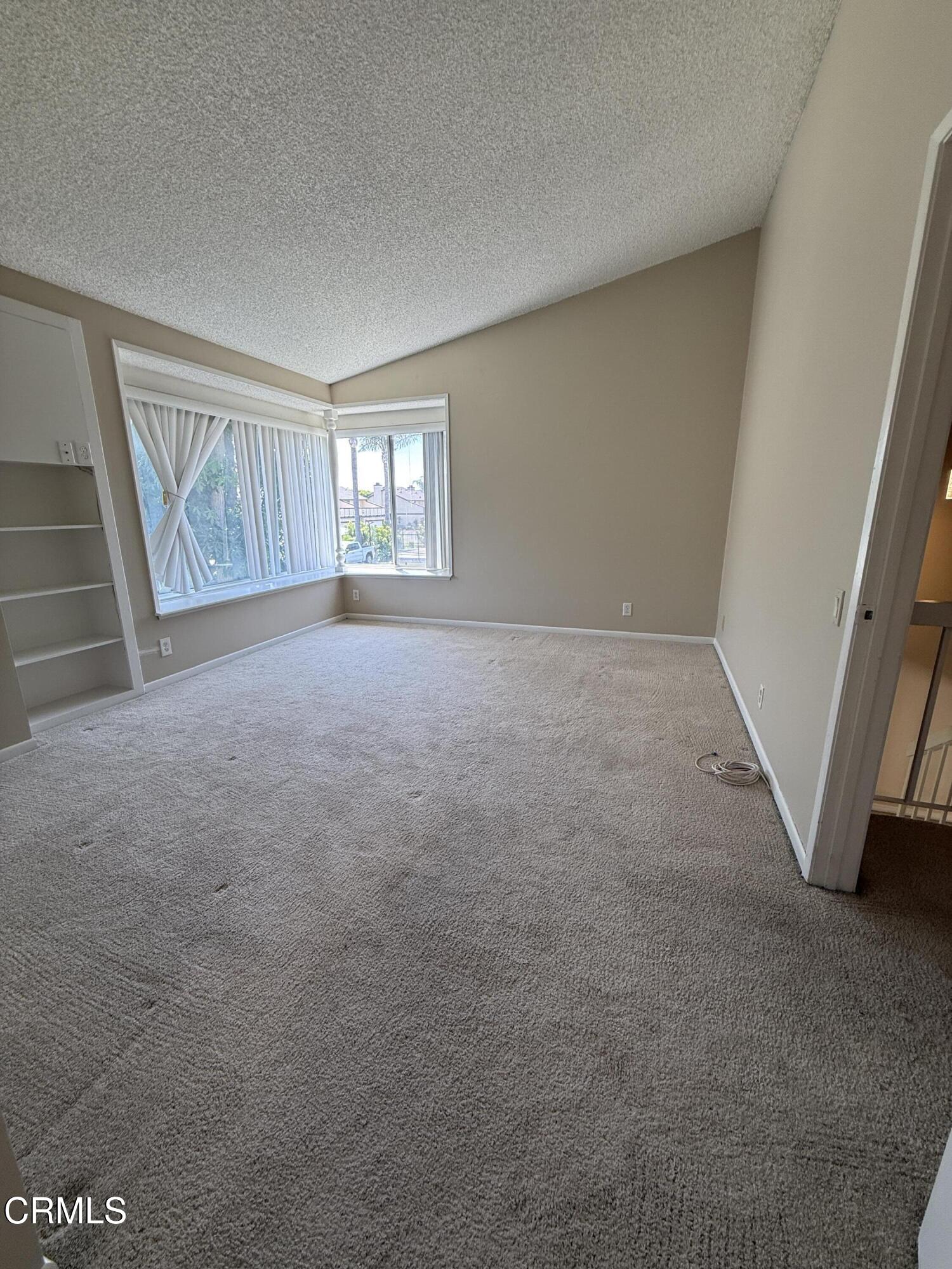 5209 Perkins Road Oxnard, CA 93033 - Photo 17 of 28 an empty room with windows