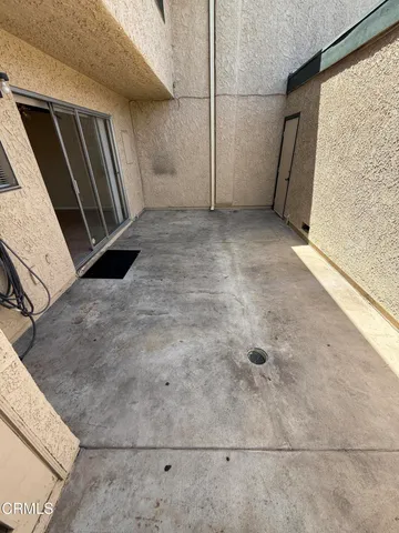 a view of backyard with garage