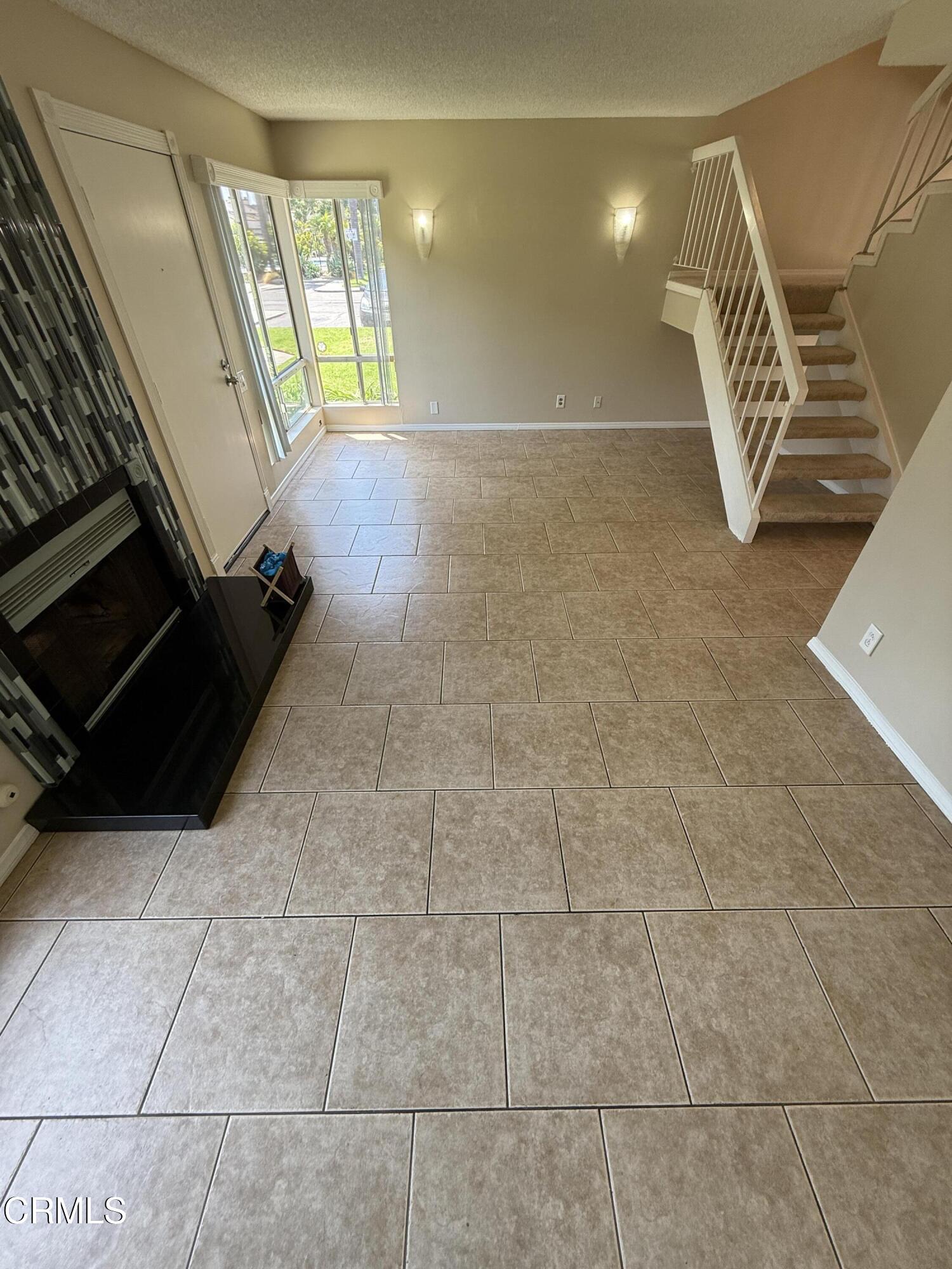 5209 Perkins Road Oxnard, CA 93033 - Photo 7 of 28 a view of an empty room with windows