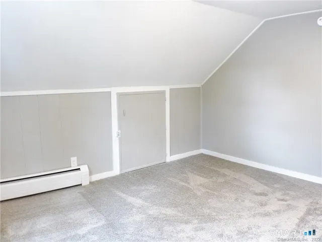 an empty room with a workbench