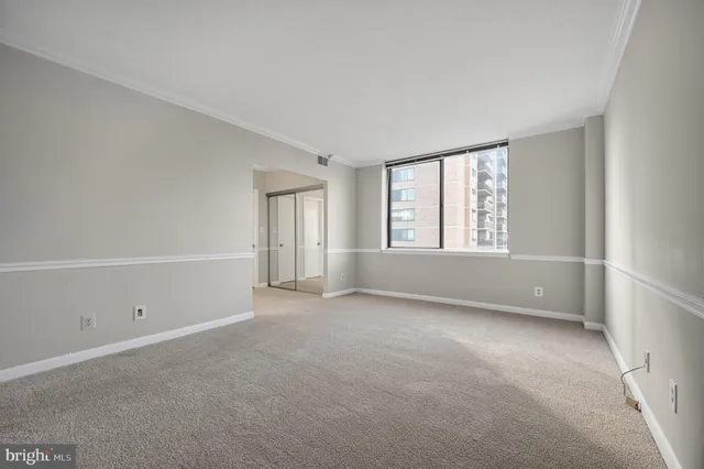 a bathroom with a tub a sink and mirrors