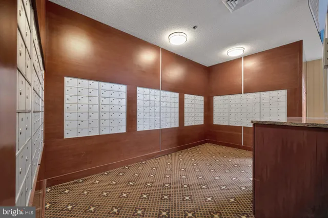 a view of a building with door and outdoor seating