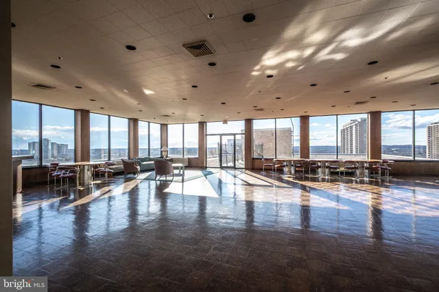 a view of a house with swimming pool and a garden