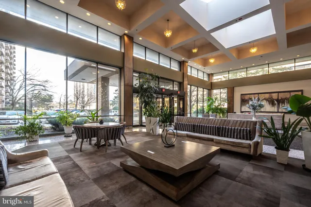 a view of multiple houses with a street