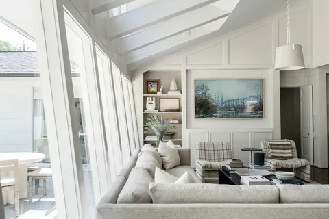 a living room with furniture and a couch