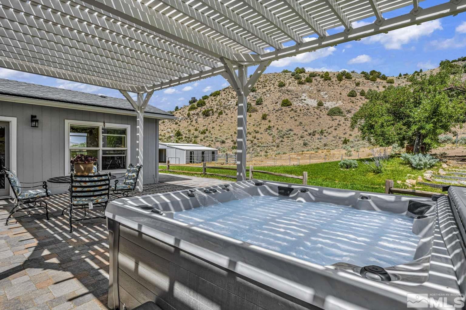 160-180 Quarter Horse Circle Reno, NV 89508 - Photo 18 of 23 a view of a backyard with sitting area