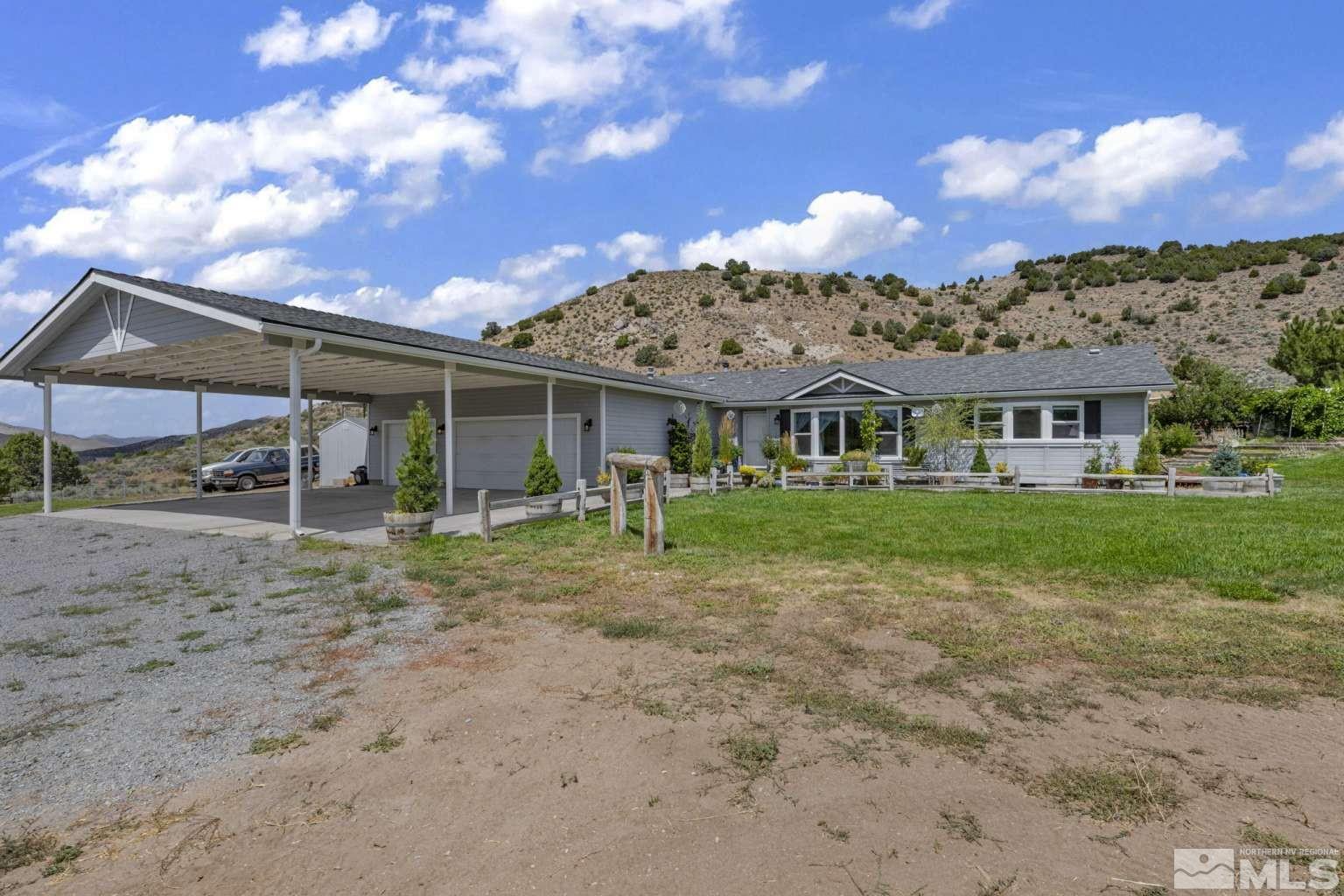 160-180 Quarter Horse Circle Reno, NV 89508 - Photo 4 of 23 a front view of a house with garden
