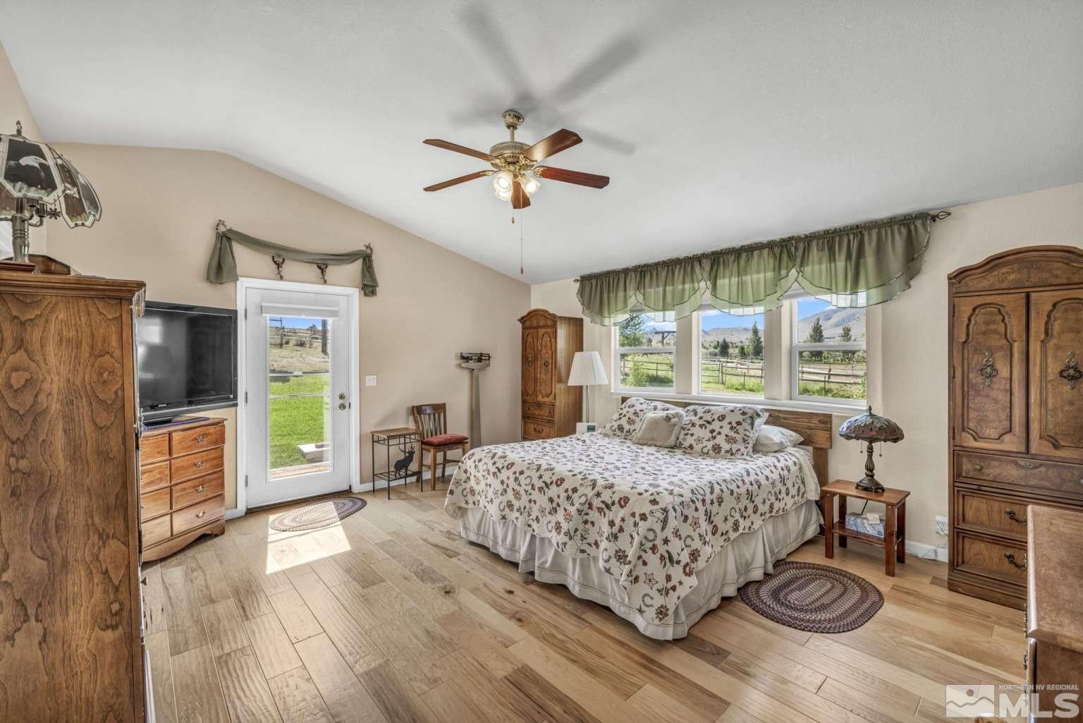 160-180 Quarter Horse Circle Reno, NV 89508 - Photo 10 of 23 a bedroom with a bed dresser and a window